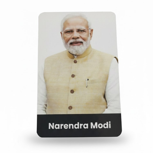 Card with a portrait of a person wearing a beige vest and white shirt, labeled 'Narendra Modi'.